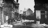 King Street, Darlaston, showing a lamp post and buildings, early 20th century