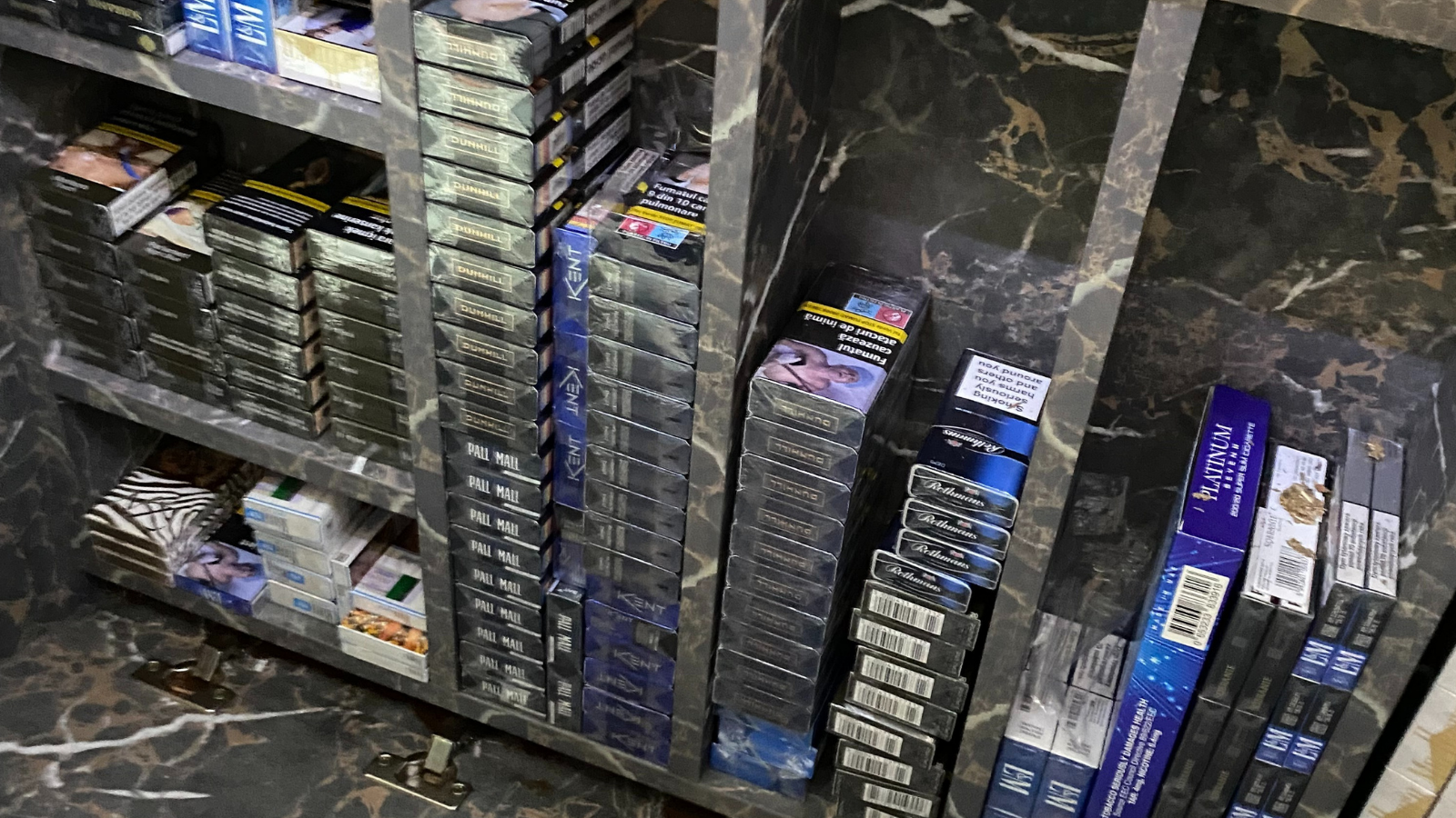 Hidden compartment full of cigarettes