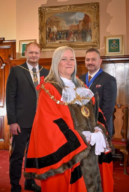 Walsall Mayor Cllr Louise Harrison (centre) with her consorts Liam Fisher (L) and Brad Fisher (R)