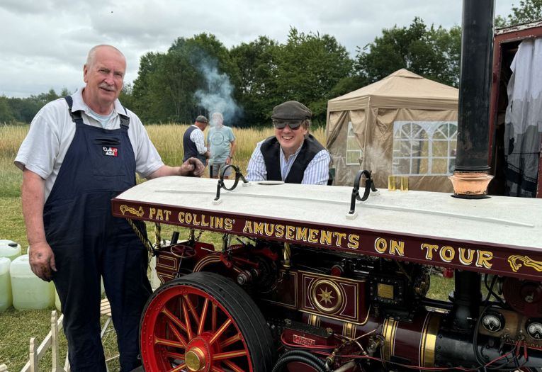 Traction engine with engineers in overalls
