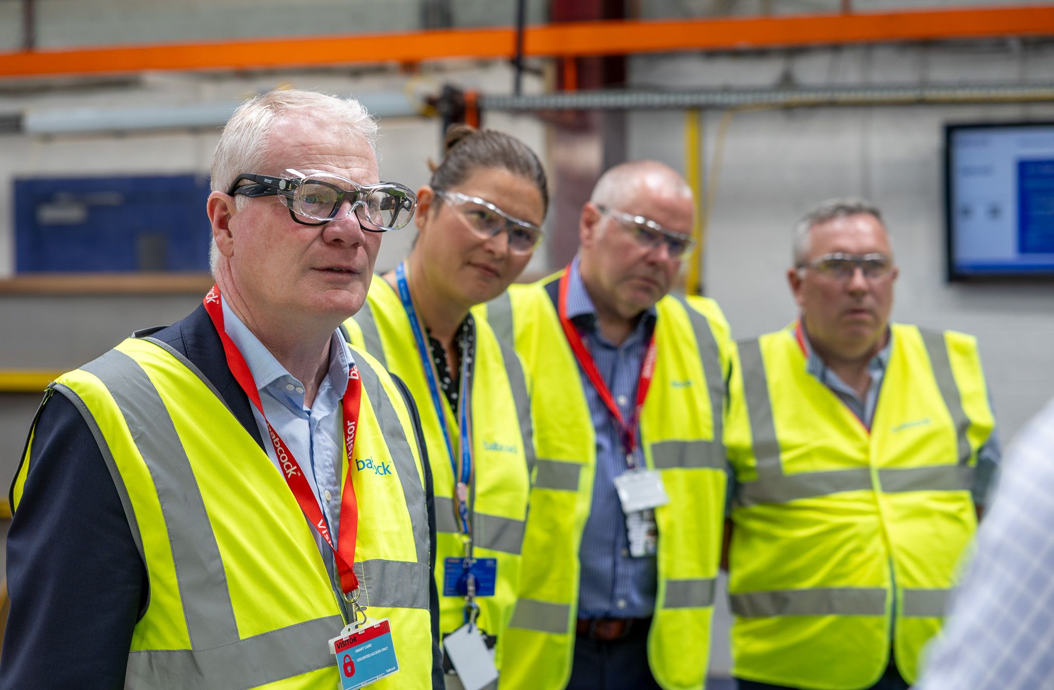 Mayor richard parker in high vis with cllr adrian andrew and others