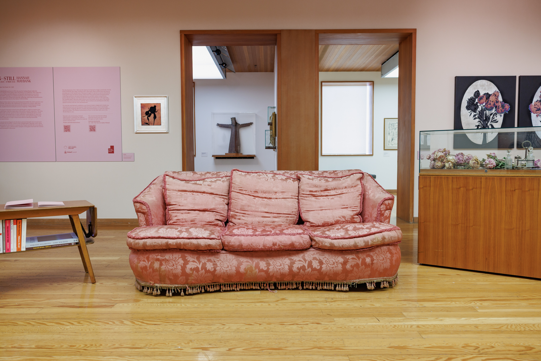 View of Hannah Maybank's exhibition featuring a sofa and table