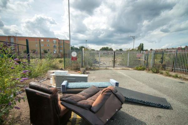 Flytipped chairs and sofas in the road