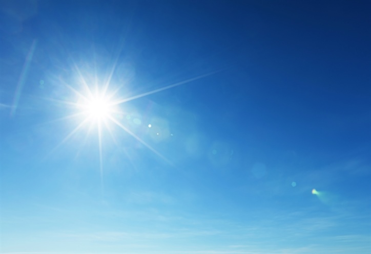 Image shows a blue sky and bright sunshine