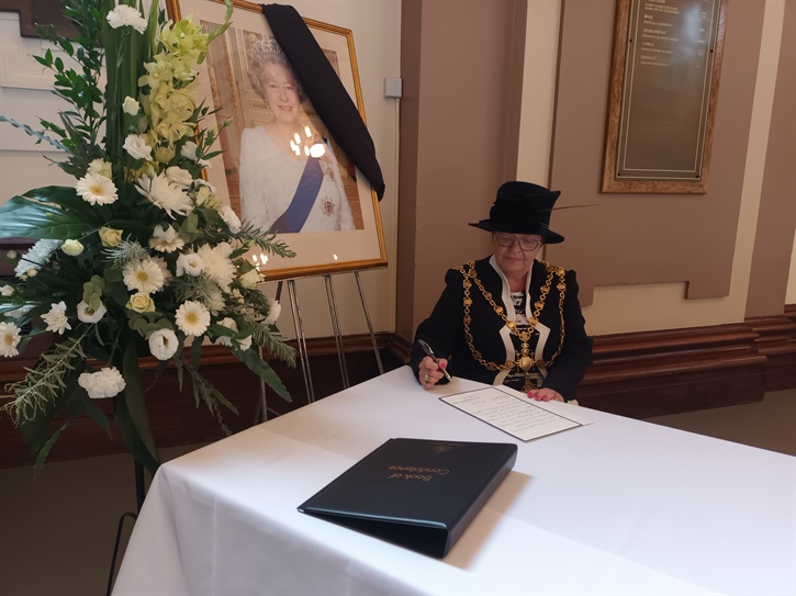 The Mayor of Walsall signing the book of condolence 