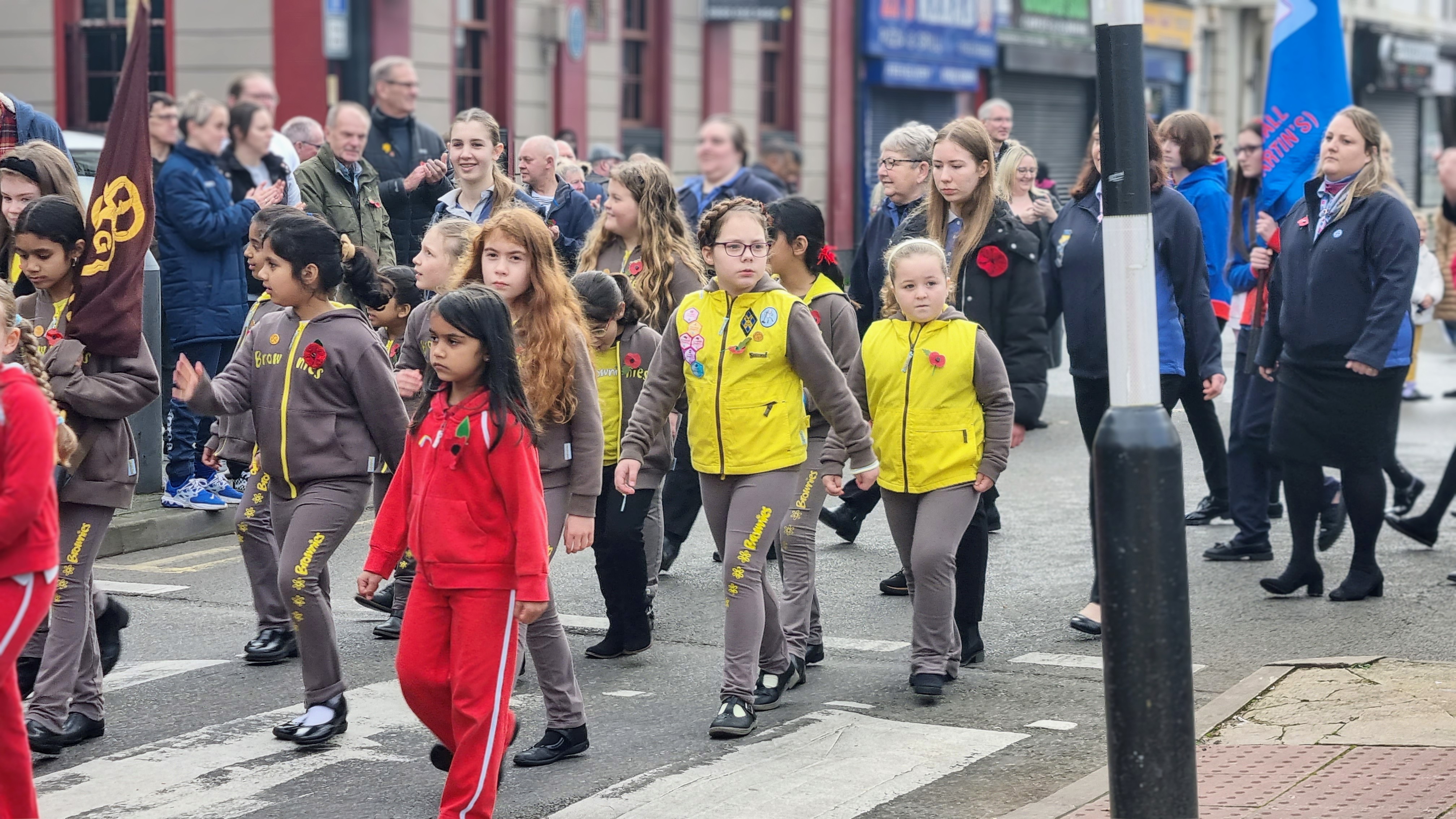 Members of the Brownies taking part in the parade