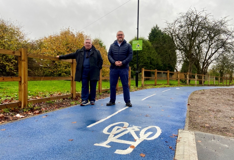 Councillor Adrian Andrew and Adam Tranter at a newly opened cycle lane on Wolverhampton Road West Bentley.