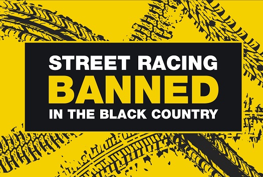 black tyre tracks on a yellow background with a black box in the middle. White and yellow text reads Street Racing Banned in the Black Country