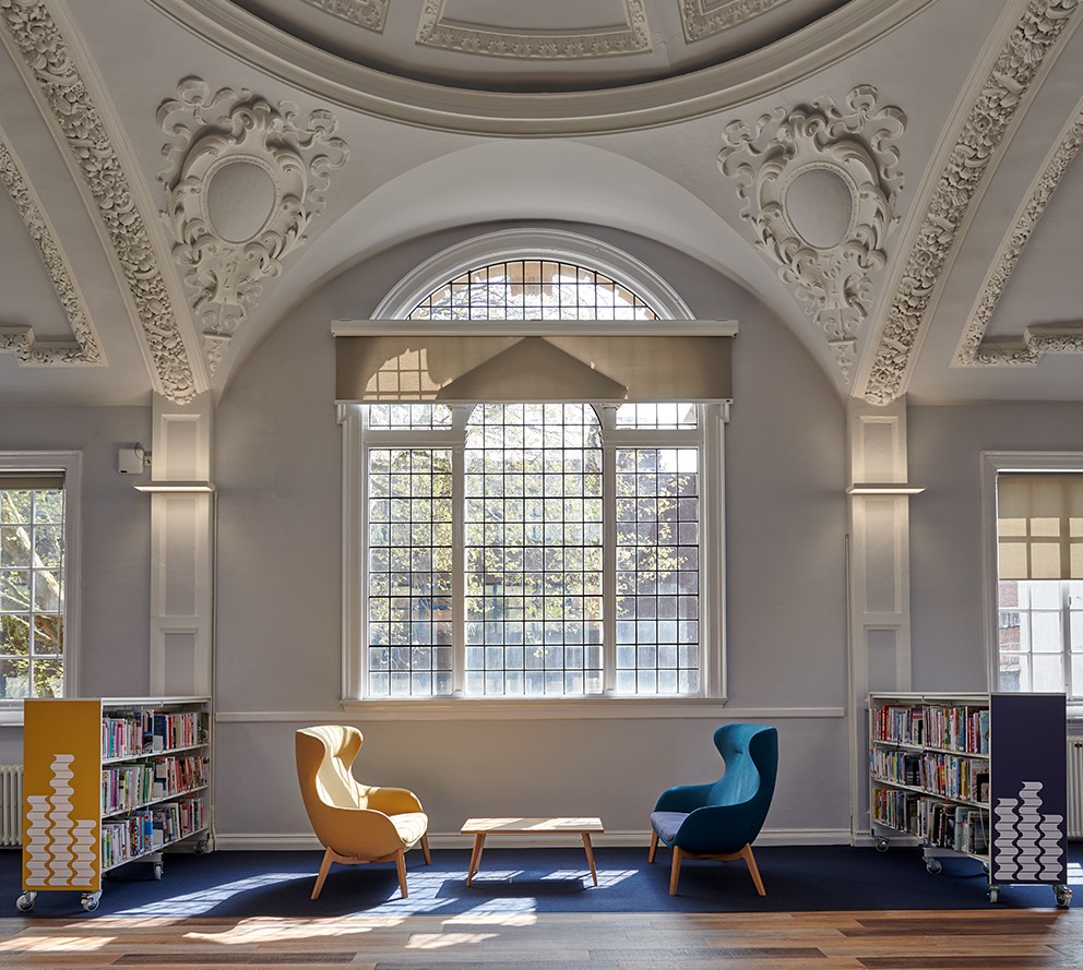 The top floor of Lichfield Street Hub, chairs and bookshelves.