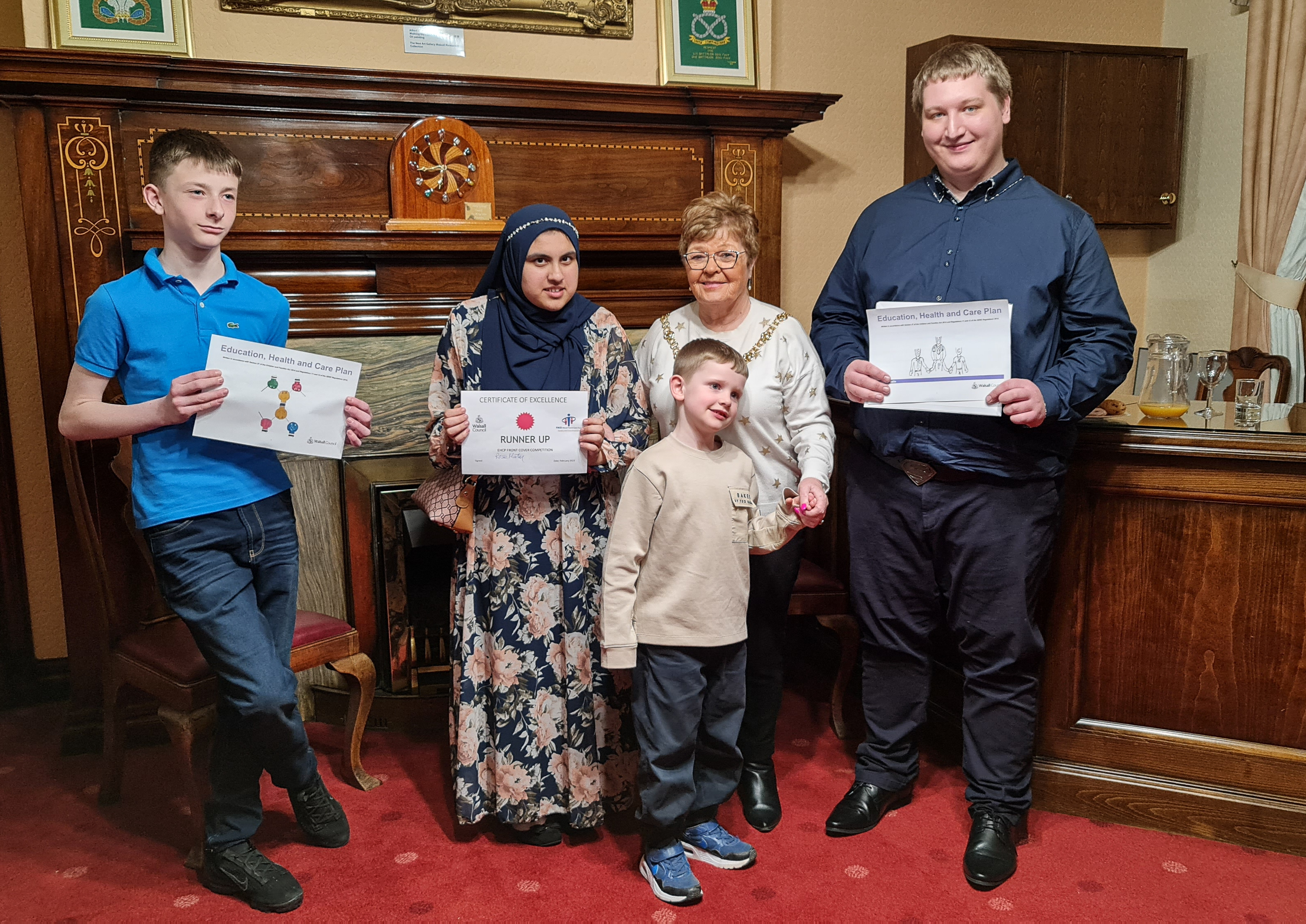 : Riley Cabrera - Under 14s winner, Irma Sharbir - Over 14s Runner up, James Tonks - Under 14s Runner up, Mayor Rose Martin, Tim Holden - Over 14s Winner. All the winners and runner ups are from Walsall.