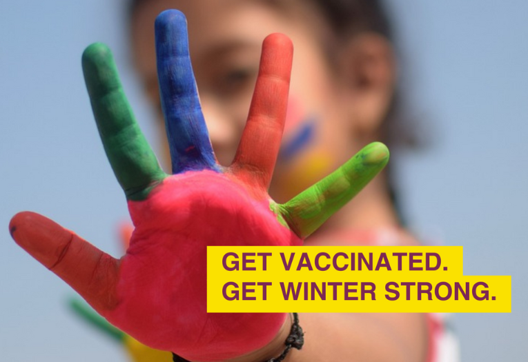 Image depicts a child holding a painted hand out. Text: Get vaccinated, get winter strong.