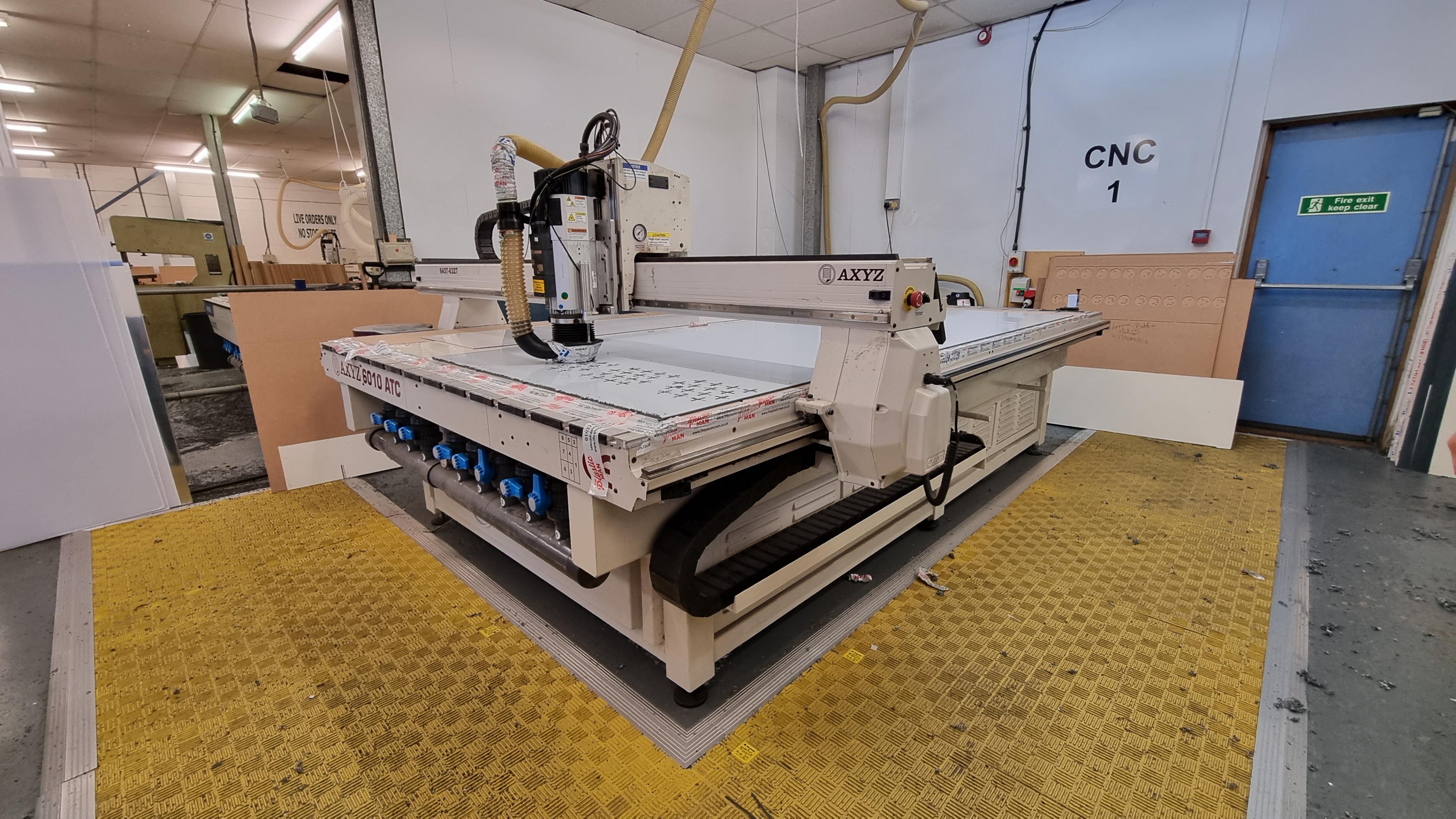 A factory floor with a large CNC Router 