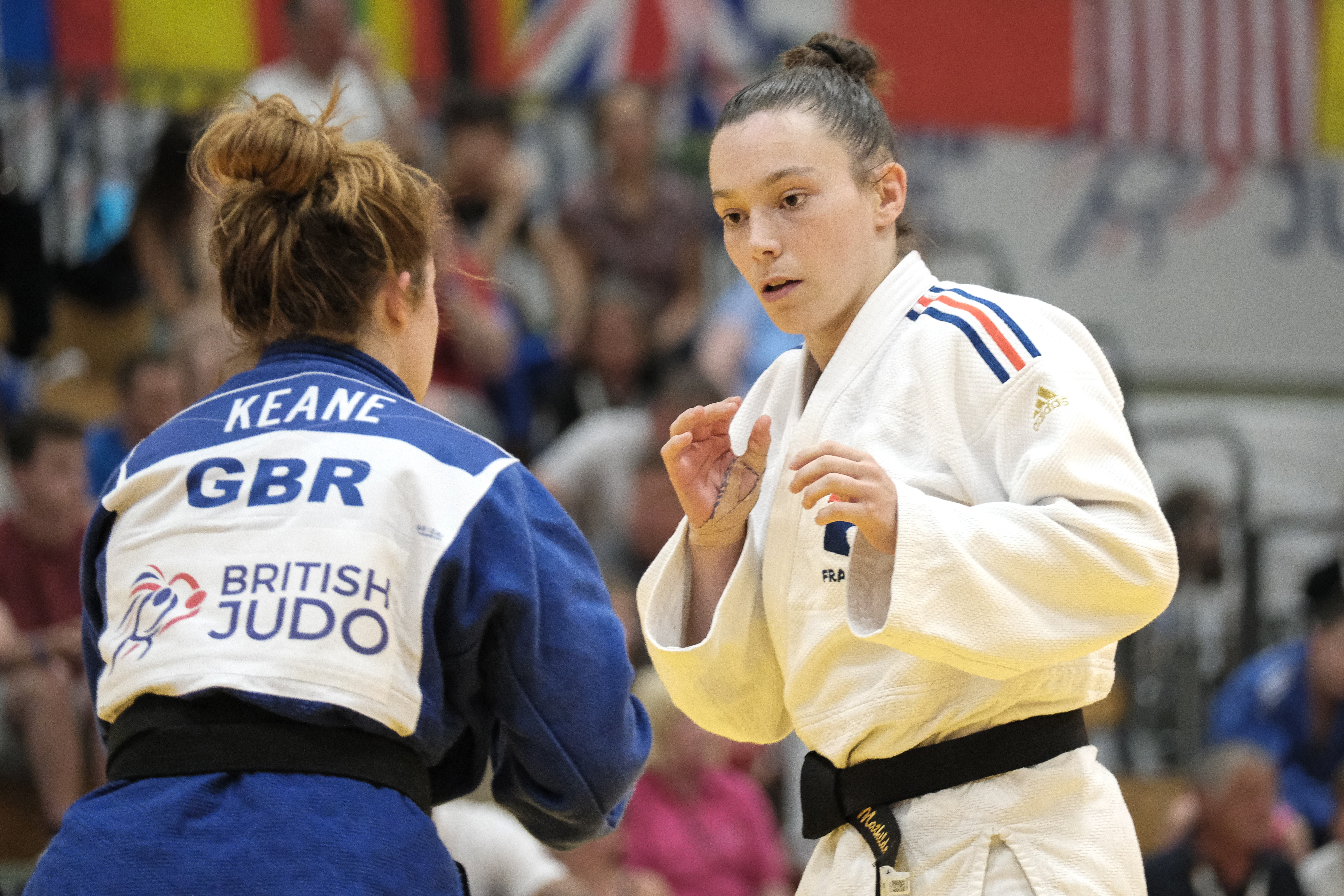 two young women taking part in judo