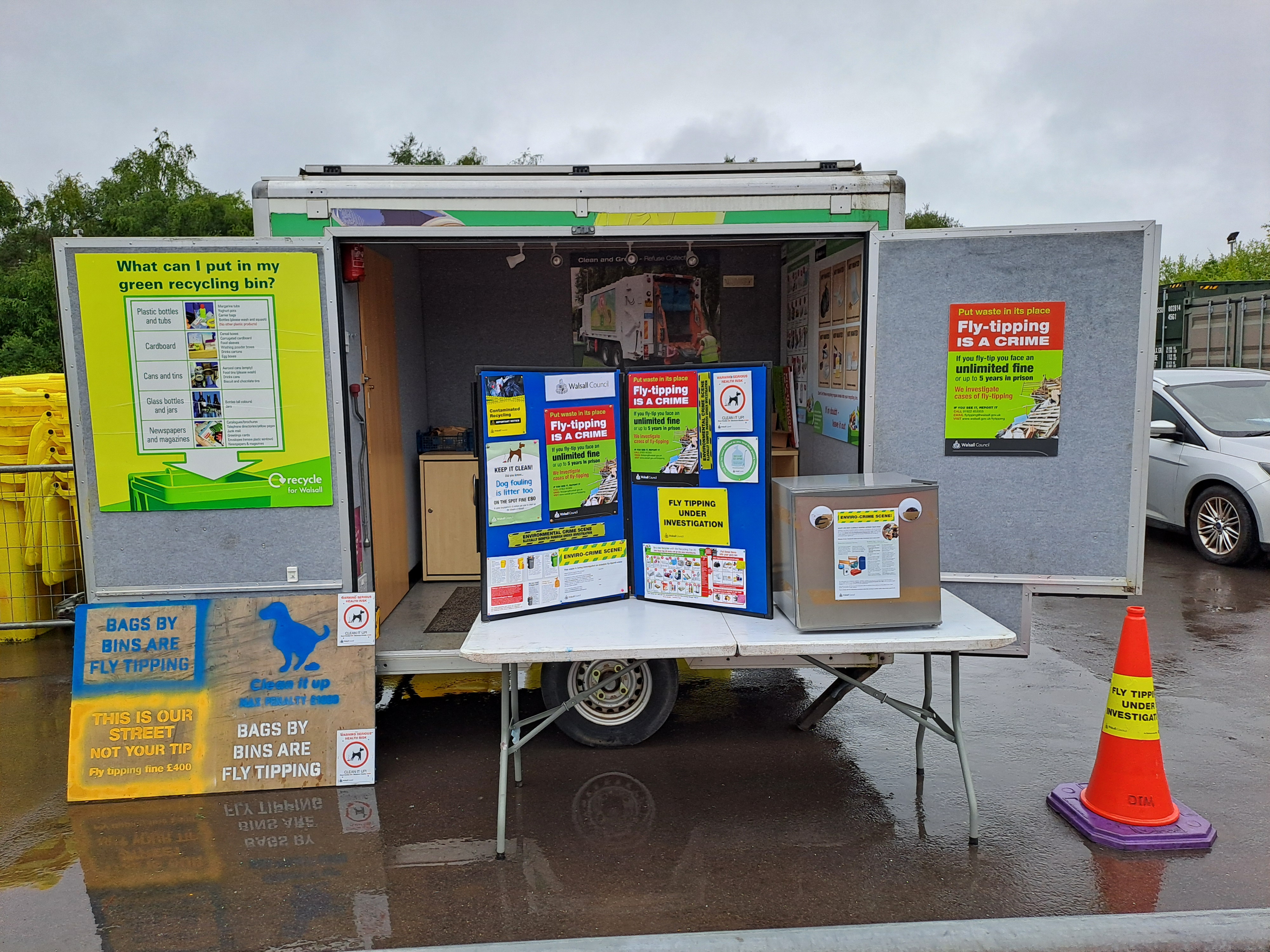 Image depicts a mock set-up of the EnviroCrime touring trailer.