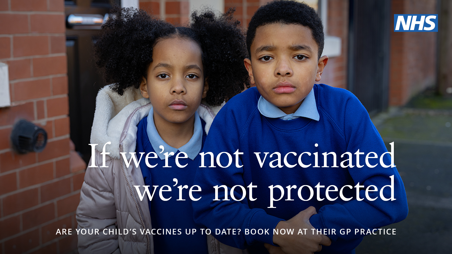 Image depicts two school children. Caption reads If we're not vaccinated, we're not protected.