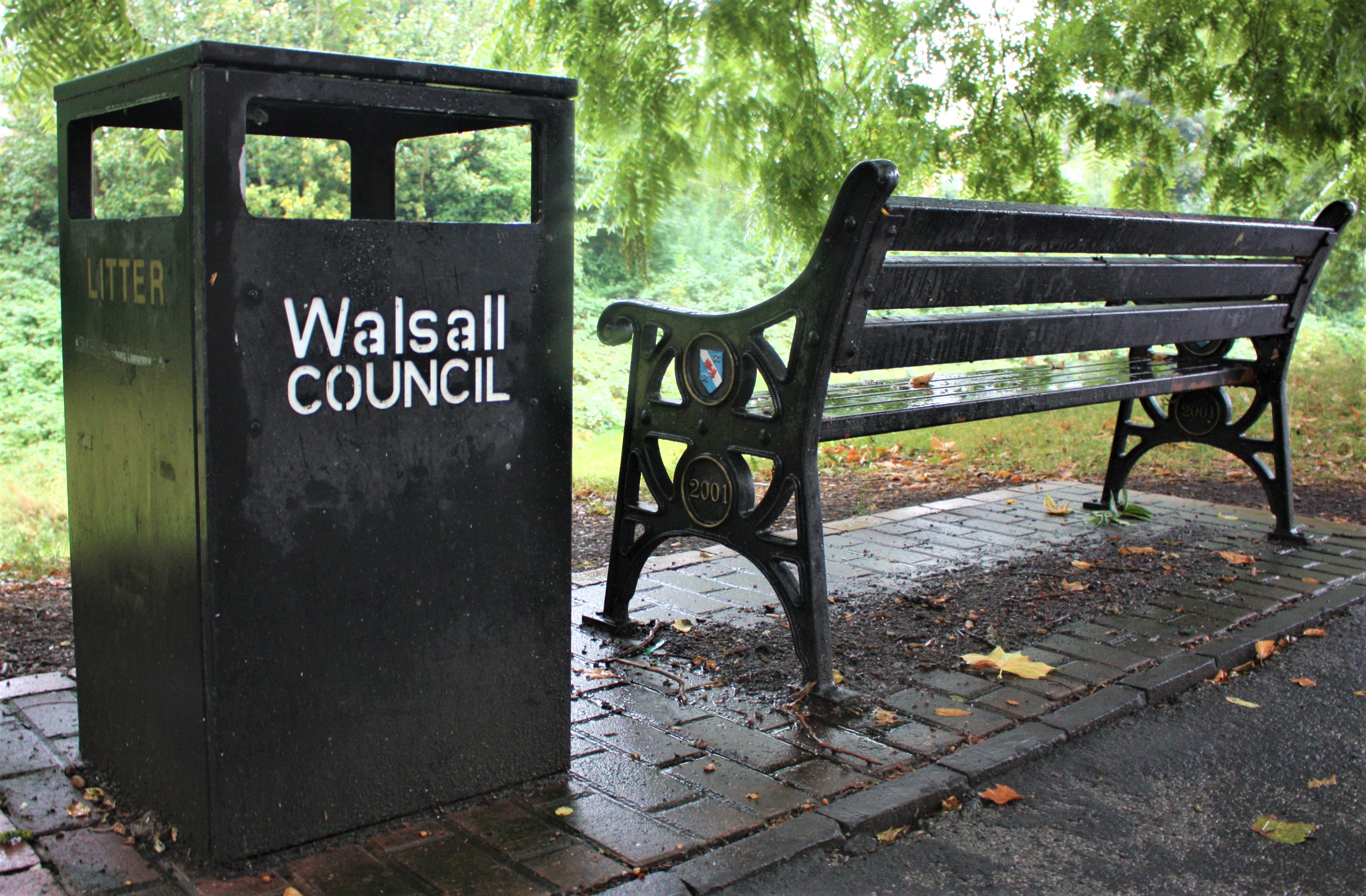 Bench next to Bin with Walsall Council logo on it