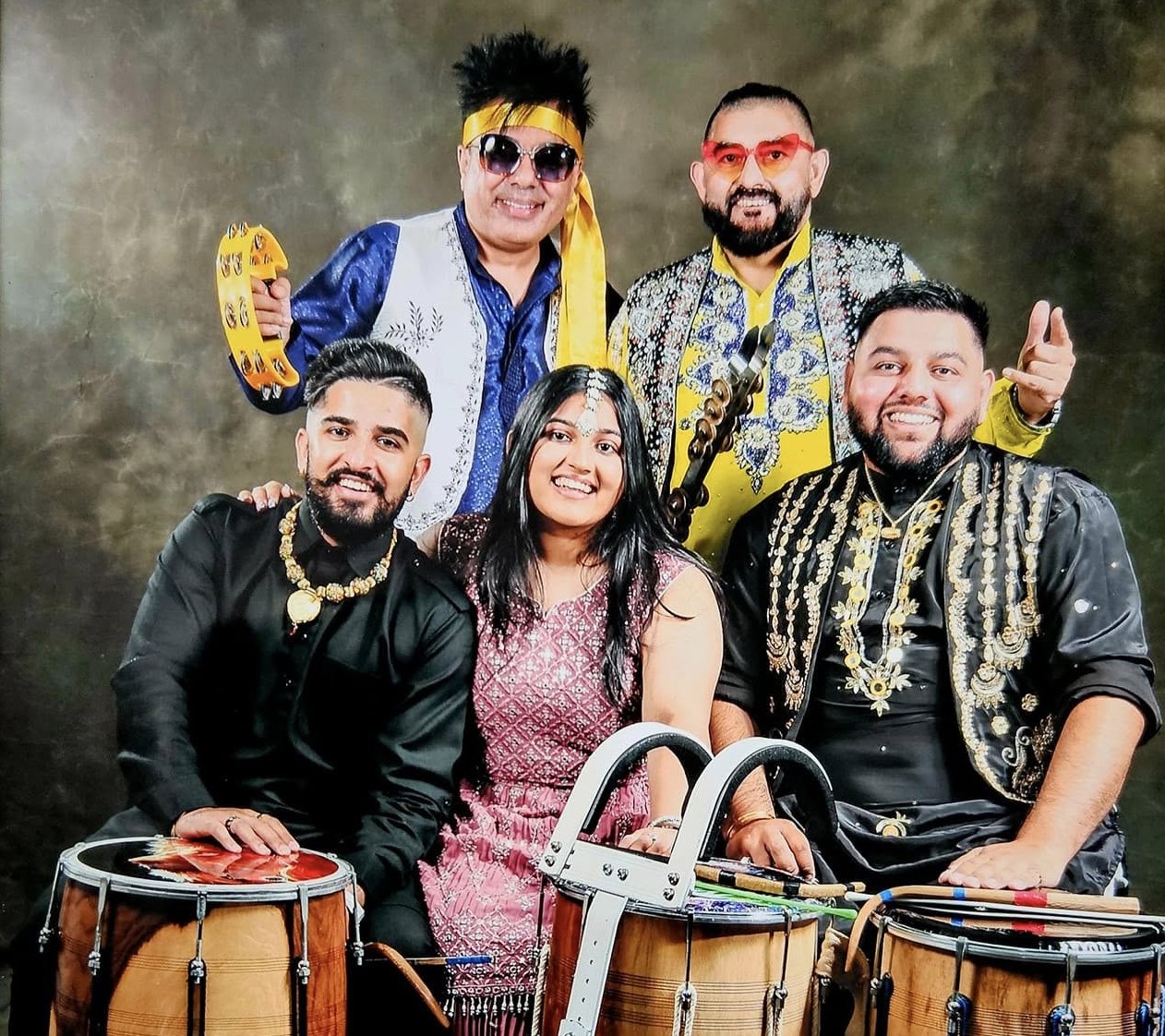 Bhangra Smash Up surrounded by dhol drums