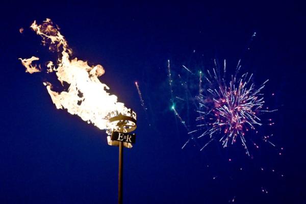 fireworks in the sky and the fire torch