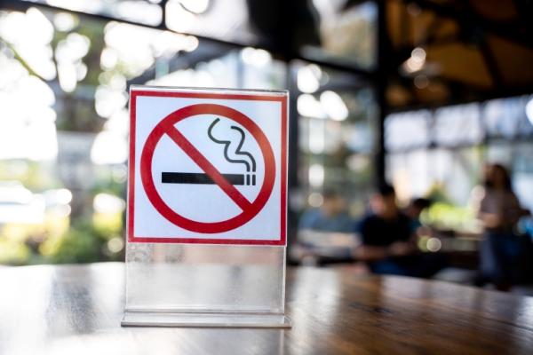 No smoking signage placed on a table.