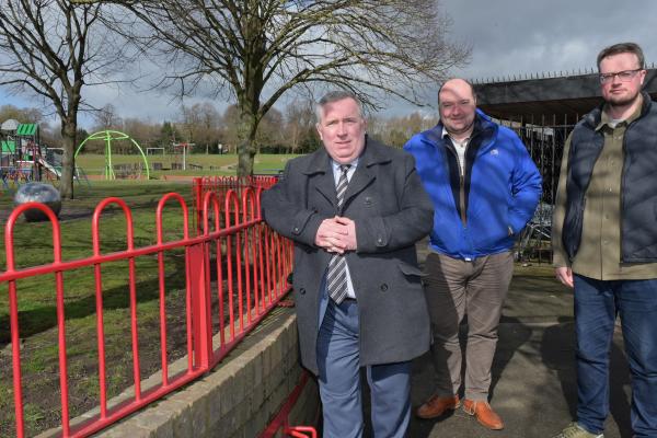 Councillor Andrew, Councillor Flint and Councillor Follows standing beside a children's park in King George V playing field Bloxwich
