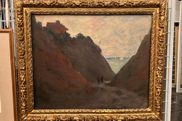 Oil painting by Claude Monet featuring cliffs, sky and sea, in the Gallerys Collection Store ready to be packed up to be sent to Japan