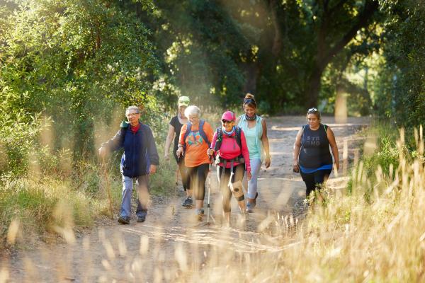Group of people on a walking trail in the park