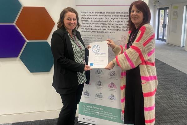 Emma Bennett, Chief Executive at Walsall Council, and Isabel Vanderheeren, Director for Early Help, Walsall Right for Children and Partnerships at Walsall Council with the Certificate of Commitment.