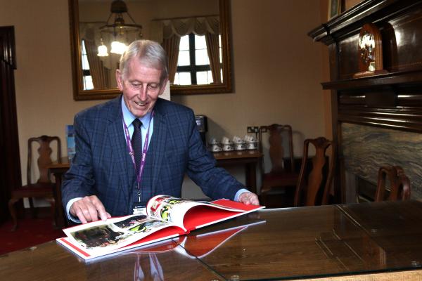 Former Mayor of Walsall Councillor Chris Towe, with his memory book