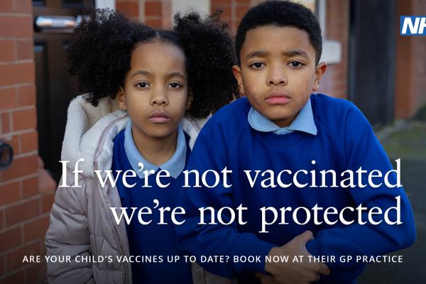 Image depicts two school children. Caption reads If we're not vaccinated, we're not protected.