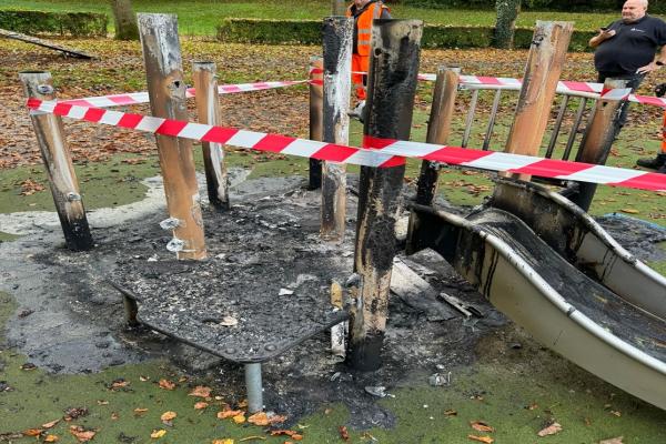 Image depicts play equipment damaged by arson in Reedswood Park.