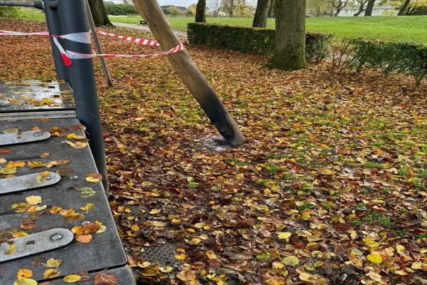 Image depicts play equipment damaged by arson in Reedswood Park.