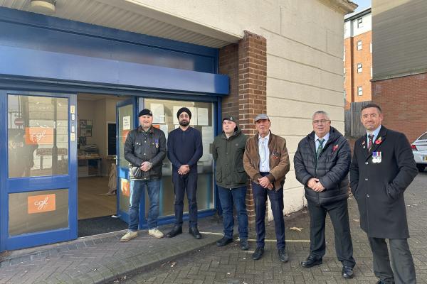 Image depicts six veterans in front of the Change Grow Live Station Street Hub in Walsall.