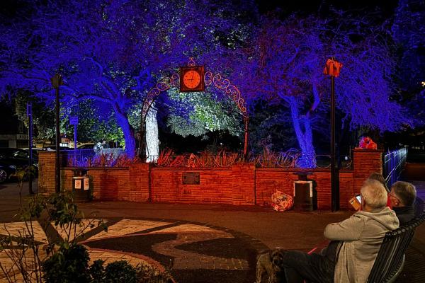 Pelsall Clock Tower lit up in red