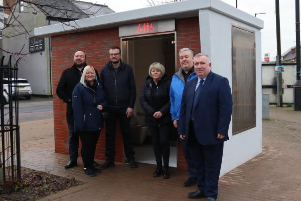 6 councillors standing in front of the new public toilet