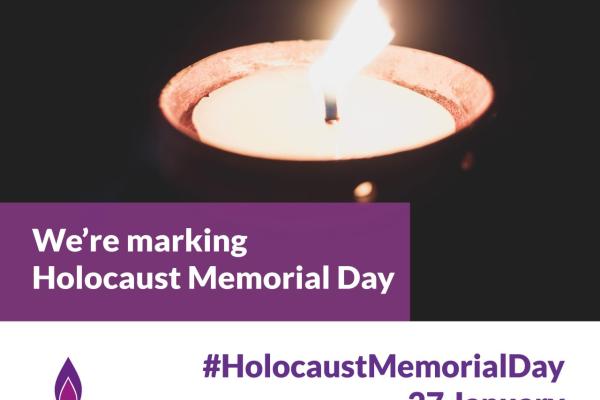 Lit Candle with graphic marking Holocaust Memorial Day, January 17 2025