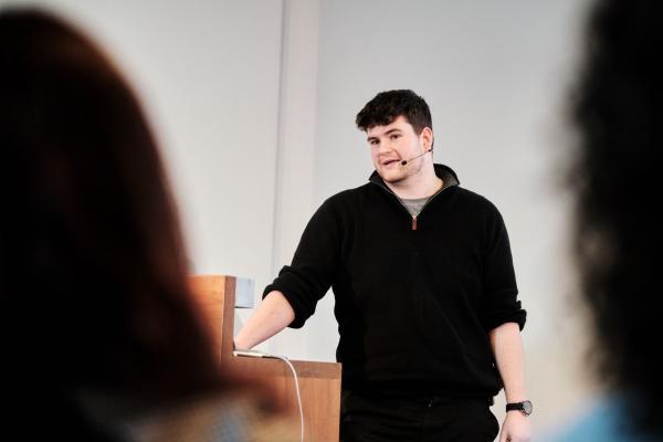 Oliver Wellings presents to an audience