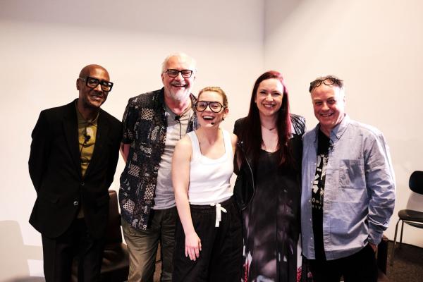 Speakers at the Photography symposium pose for a photograph