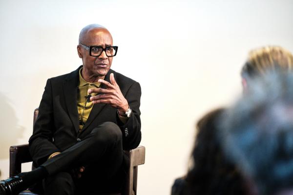 Dr Pogus Caesar talks to an audience