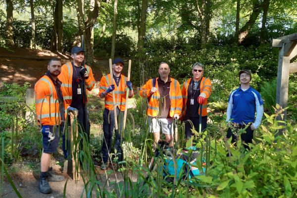 Team in hi vis jackets at Willenhall Memorial Park