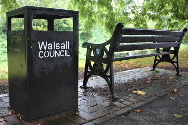 Bench next to Bin with Walsall Council logo on it