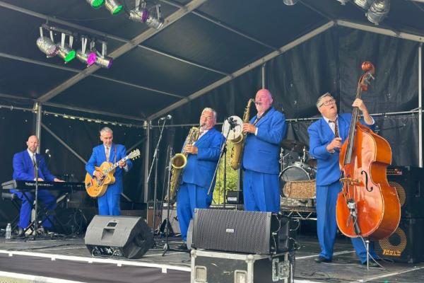 King Pleasure and the Biscuit Boys performing on stage