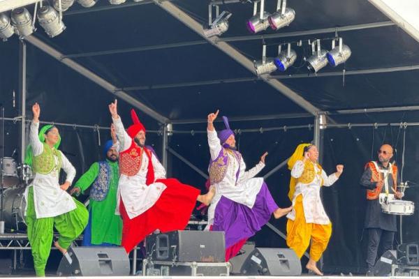 Bhangra band dancing in unison