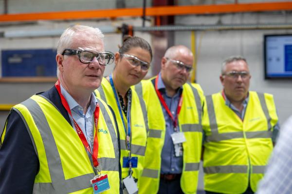 Mayor richard parker in high vis with cllr adrian andrew and others