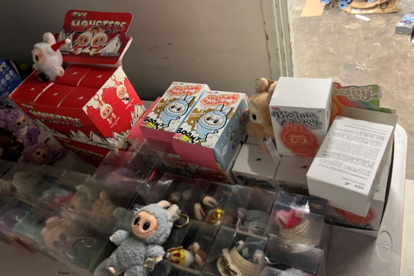 Toys in containers on floor